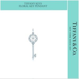 Tiffany & Co 18k White Gold Diamond Key Pendant